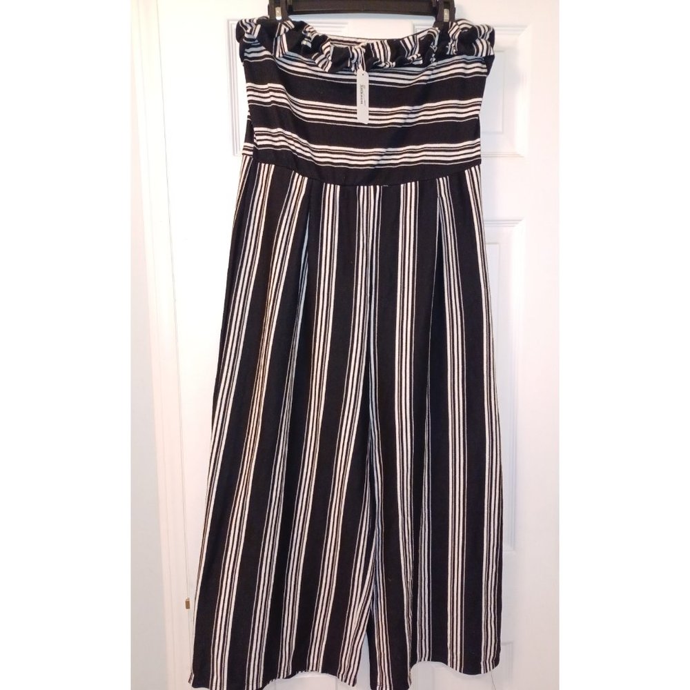 Eyeshadow black and white stripe ruffle top jumpsuit. Size large. New with tags.